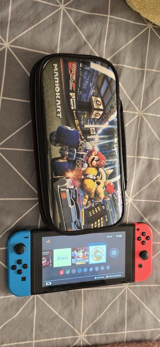 Nintendo Switch  + Caja y Accesorios
