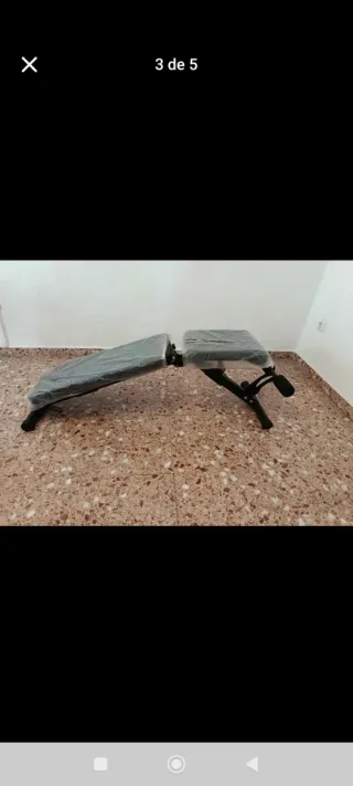 Banco de musculación con discos