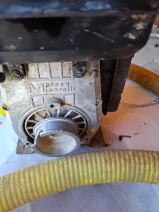 Bomba de agua con manguerasauto aspirante