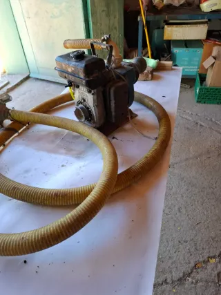 Bomba de agua con manguerasauto aspirante