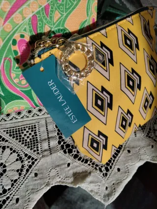 Neceser Estee Lauder y serum.