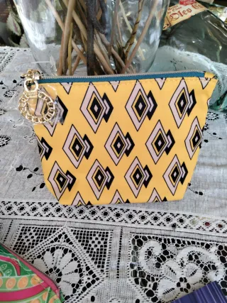 Neceser Estee Lauder y serum.