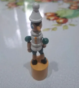 4 statuette vintage legno, tra cui Pinocchio