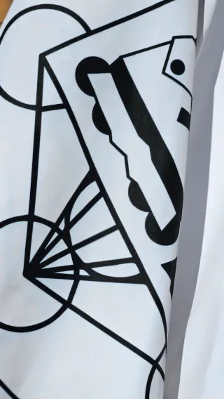 Cortavientos blanco con estampado MAGNET SKATE