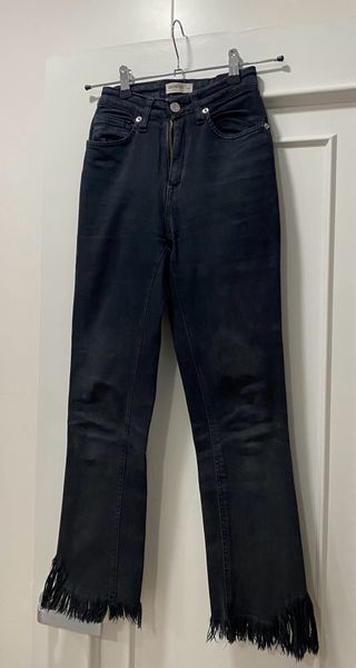 Pantalón vaquero Brownie negro con flecos