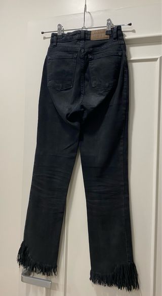 Pantalón vaquero Brownie negro con flecos