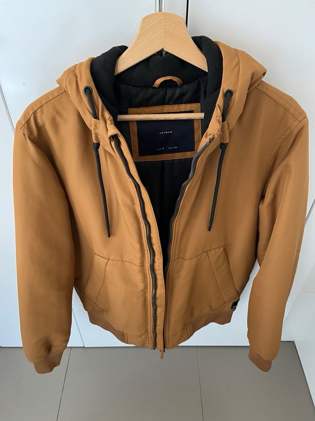 Chaqueta bomber color mostaza