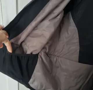 T.L  Cazadora impermeable con gorra azul marino