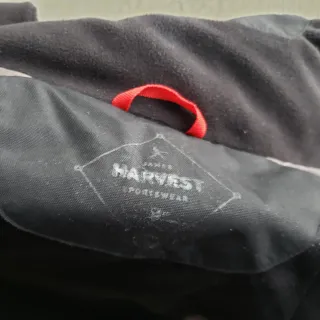 T.L  Cazadora impermeable con gorra azul marino