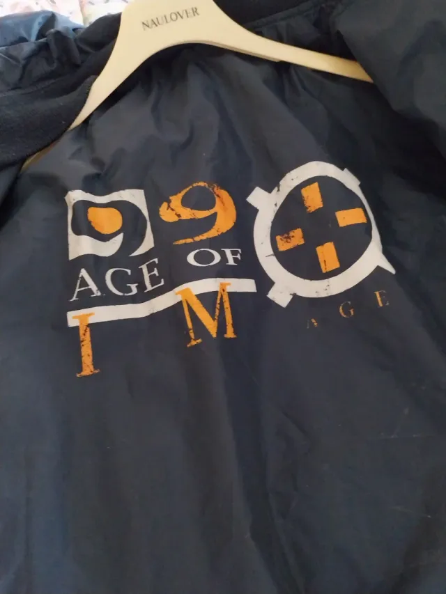 Anorak chico verdeReversible en negro