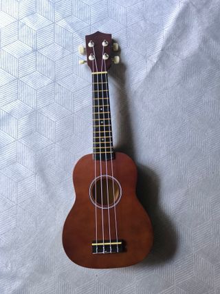 Ukelele Soprano 21", funda y accesorios - Marrón