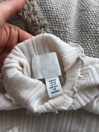 Jersey H&M cuello alto manga acampanada