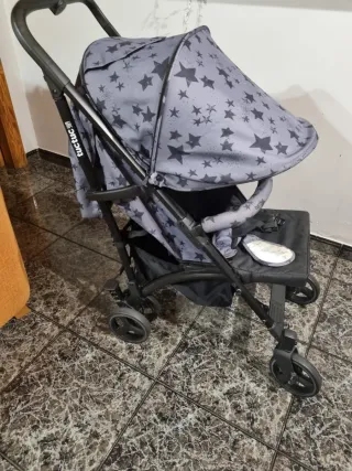 Silla de paseo marca Tuc Tuc con saco y mochila