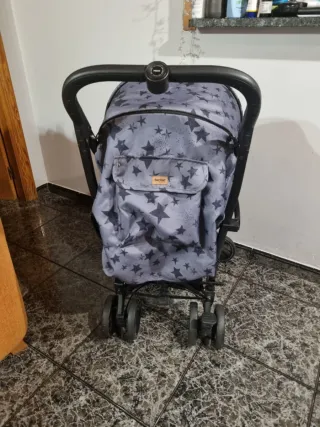 Silla de paseo marca Tuc Tuc con saco y mochila