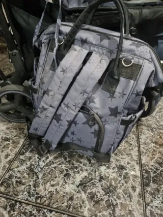 Silla de paseo marca Tuc Tuc con saco y mochila