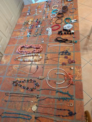 Lotto gioielli e bigiotteria + oro 18k