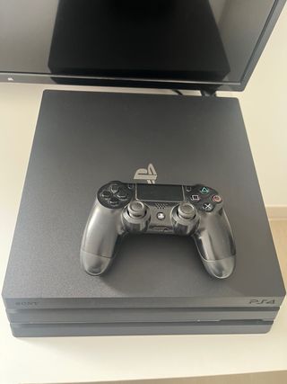 PS4 Pro 1TB con mando y Pack de juegos.