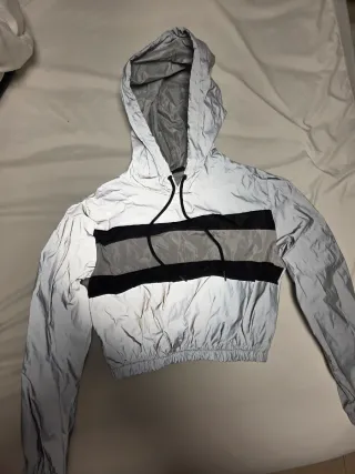 Chaqueta impermeable reflectante corto