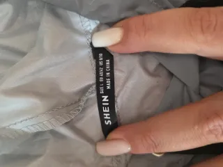 Chaqueta impermeable reflectante corto