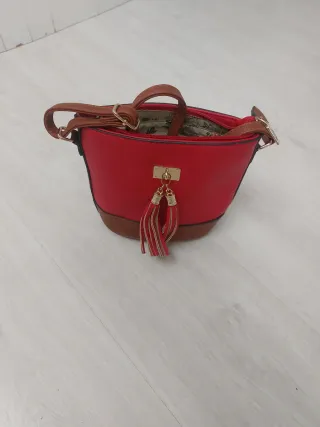 Bolso tipo bombonera bicolor polipiel
