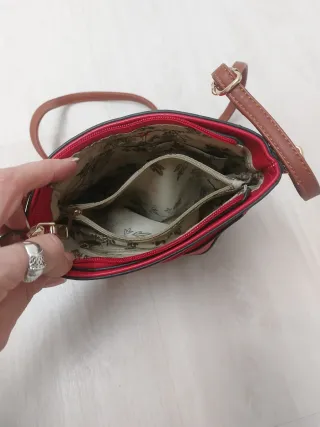 Bolso tipo bombonera bicolor polipiel