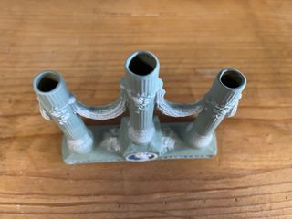 Candelabro de cerámica estilo antiguo