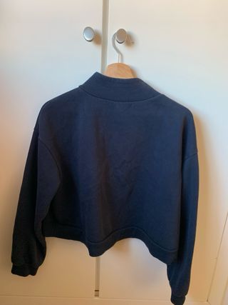 Sudadera corta azul marino con cremallera