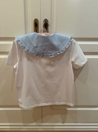 Camiseta de Zara talla XS. Lleva el cuello de bebé