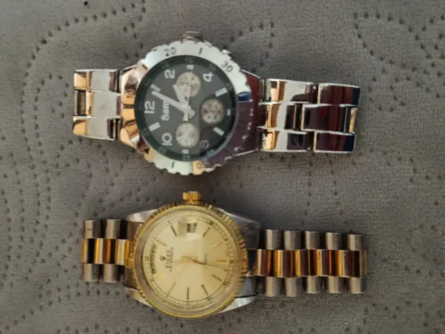 Lote 2 Relojes Sam Plata y Morado