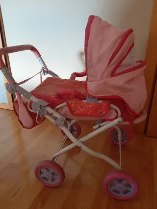 Carrito de muñecas rosa