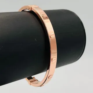 PULSERA RIGIDA TORNILLO ORO ROSA. Hueca. Oro 18k.