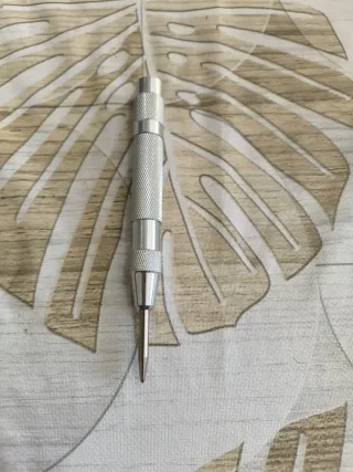 Punzón central automático metálico