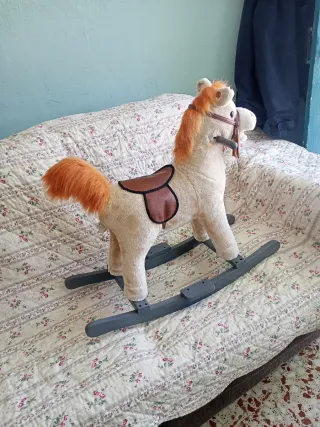 Caballo balancín con sonido