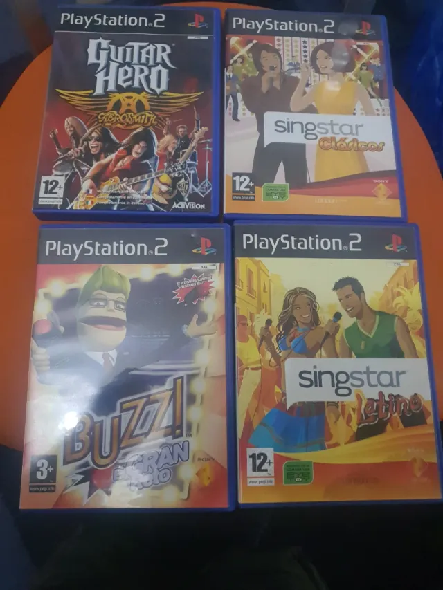 Lote 5 jogos PS2: Guitar Hero, Buzz, Singstar
