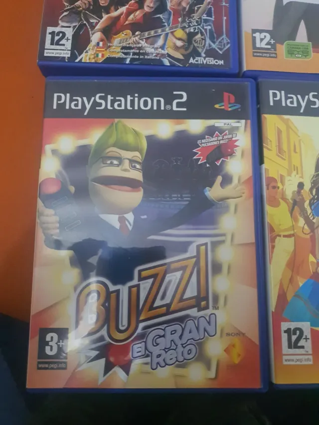 Lote 5 jogos PS2: Guitar Hero, Buzz, Singstar