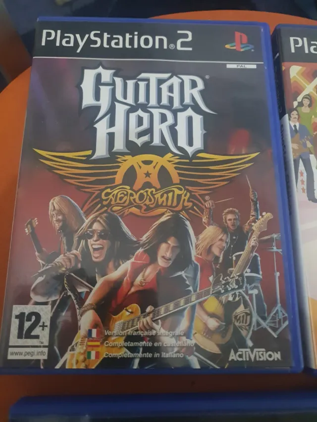 Lote 5 jogos PS2: Guitar Hero, Buzz, Singstar