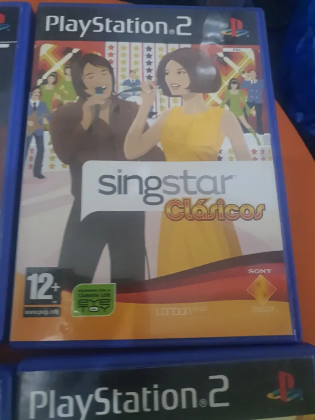 Lote 5 jogos PS2: Guitar Hero, Buzz, Singstar
