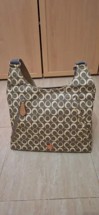 Bolso bebé con compartimentos