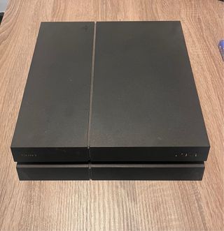 PS4 + Mando + 10 Juegos