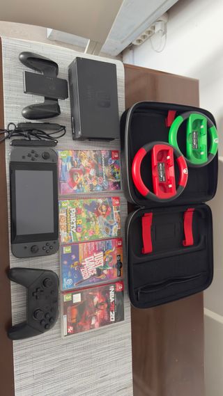 Nintendo Switch + Accesorios y Juegos