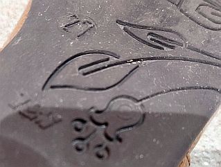 Zapatitos marrones con lazo