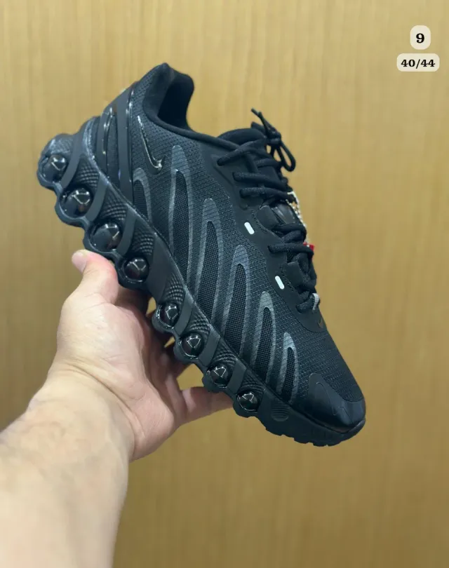 Conjunto Under Armour gris y naranja