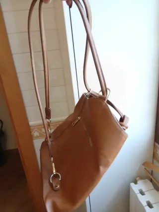 Borsa in pelle marrone a spalla e zaino