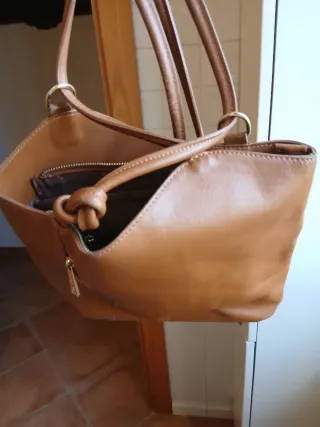 Borsa in pelle marrone a spalla e zaino