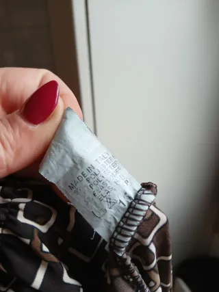 Abito fantasia geometrica manica lunga