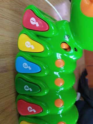 Oruga interactiva musical,con cuerda para tirar