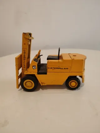 Macchine Caterpillar e Jaguar vintage Joal