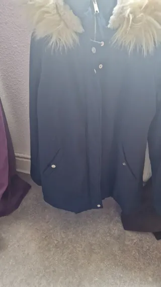 Vari modelli di cappotti