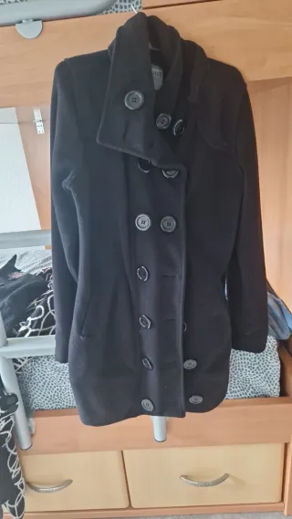 Vari modelli di cappotti