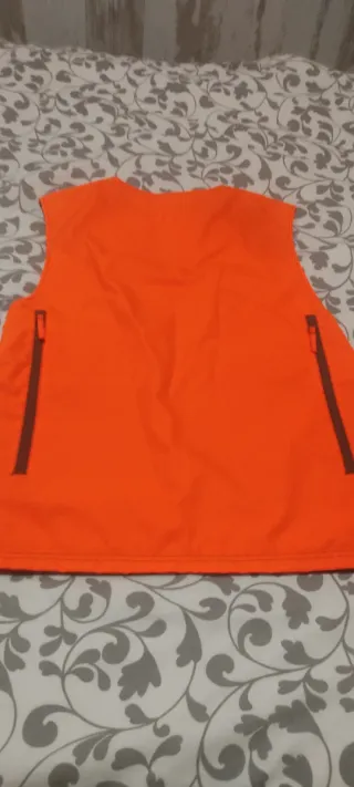 Chaleco de caza reversible verde y naranja